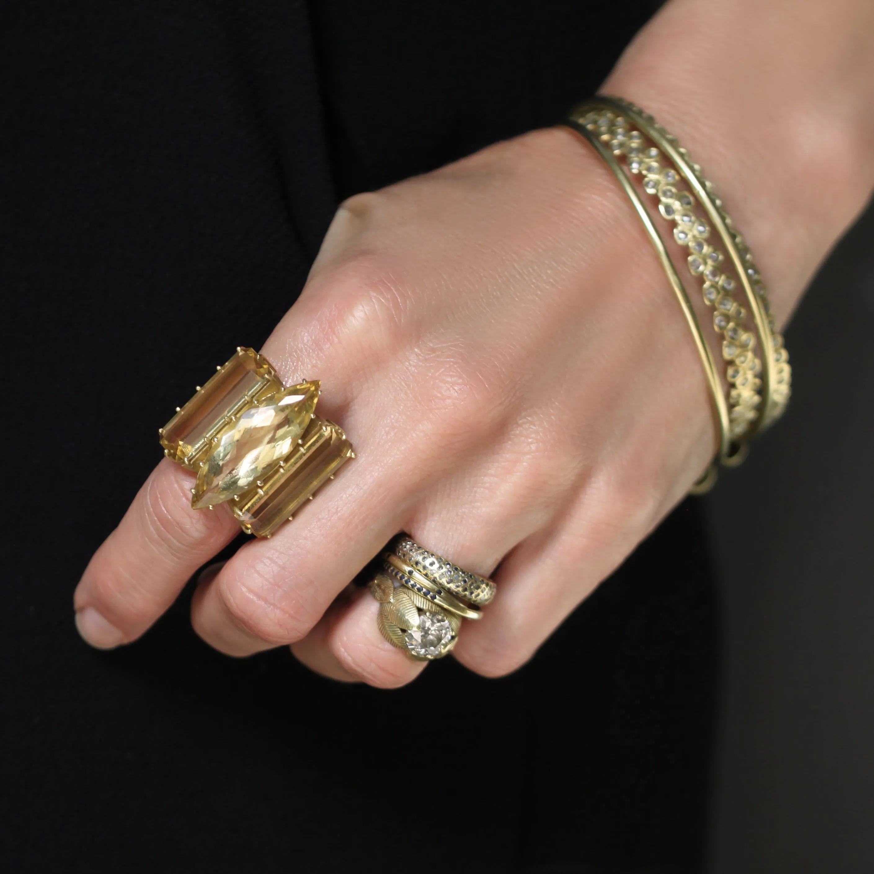A Triple Golden Beryl Ring