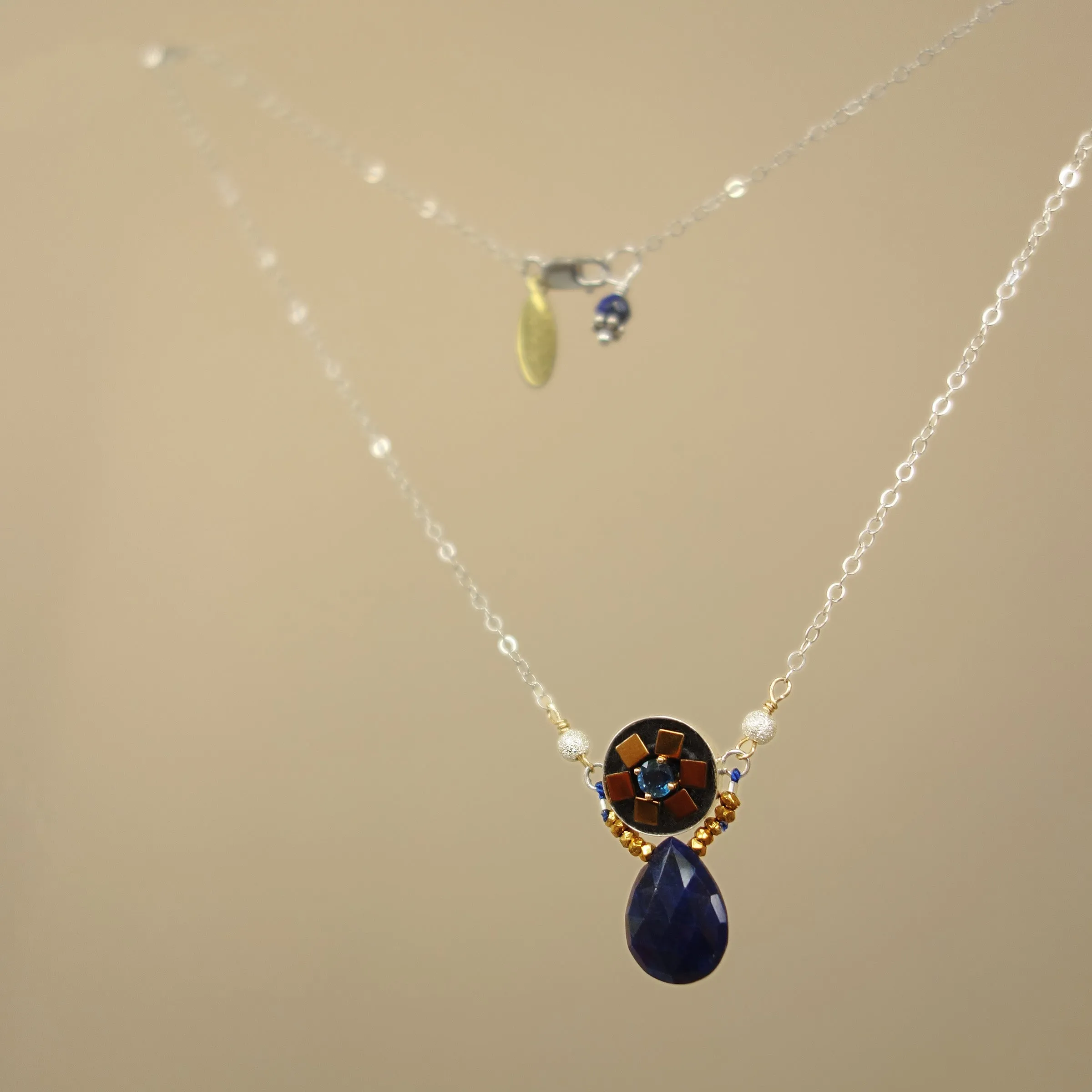 Alicia's heart of gold: blue sapphire mosaic necklace