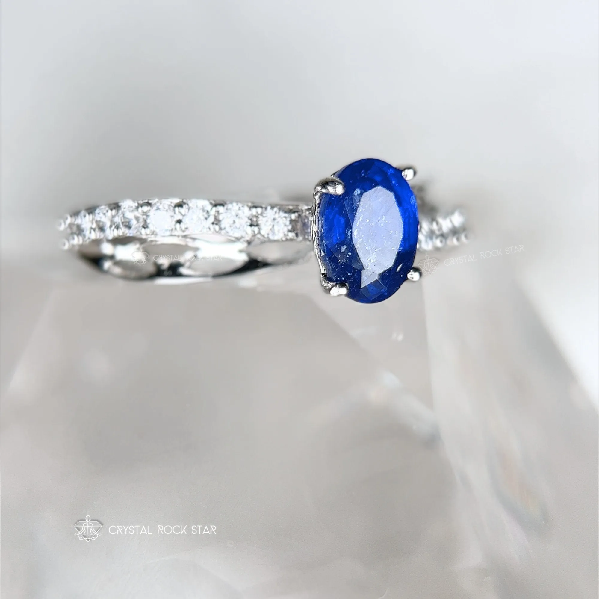 Blue Sapphire Oval Twist Sterling Silver Ring