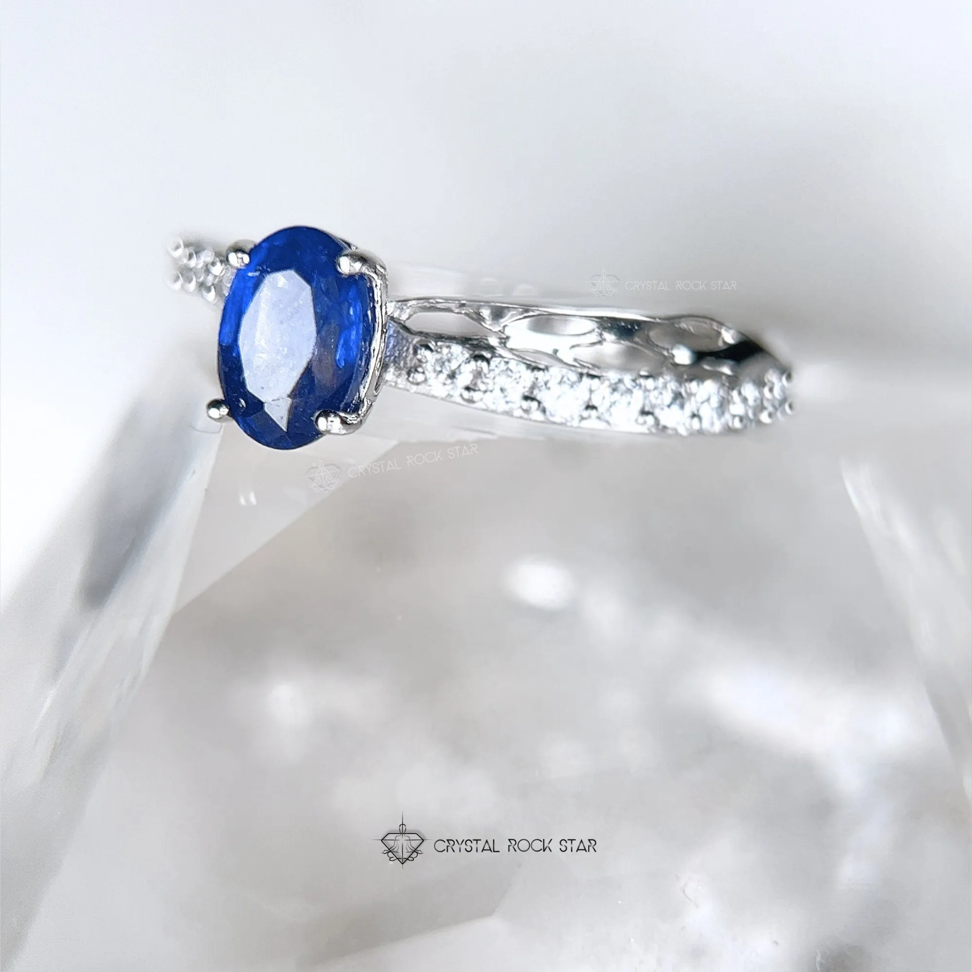 Blue Sapphire Oval Twist Sterling Silver Ring