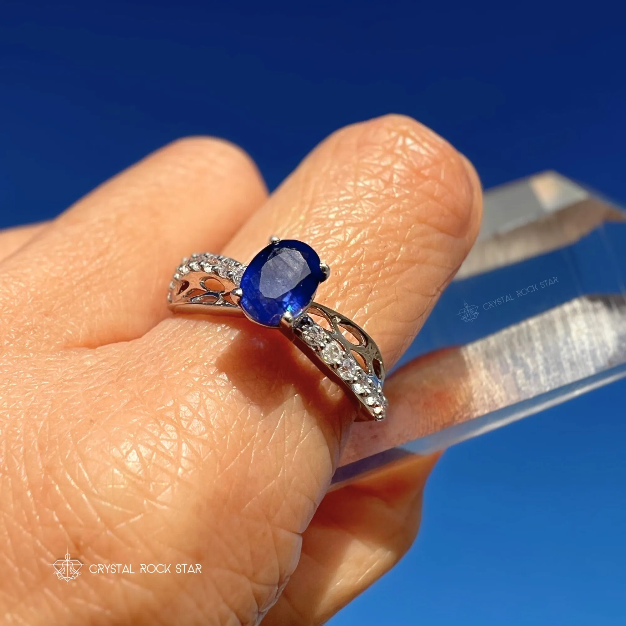 Blue Sapphire Oval Twist Sterling Silver Ring