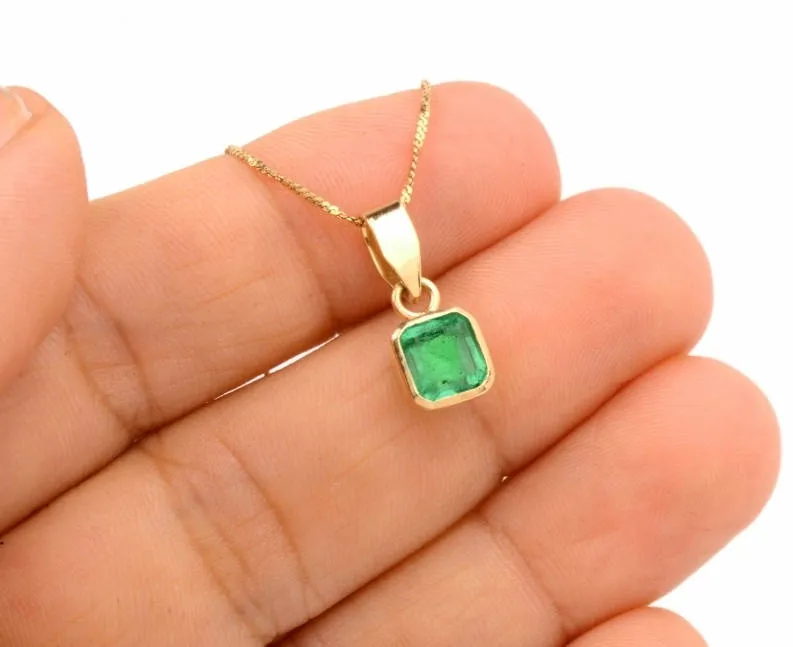 Carat and a Half Emerald Pendant in 18K Yellow Gold