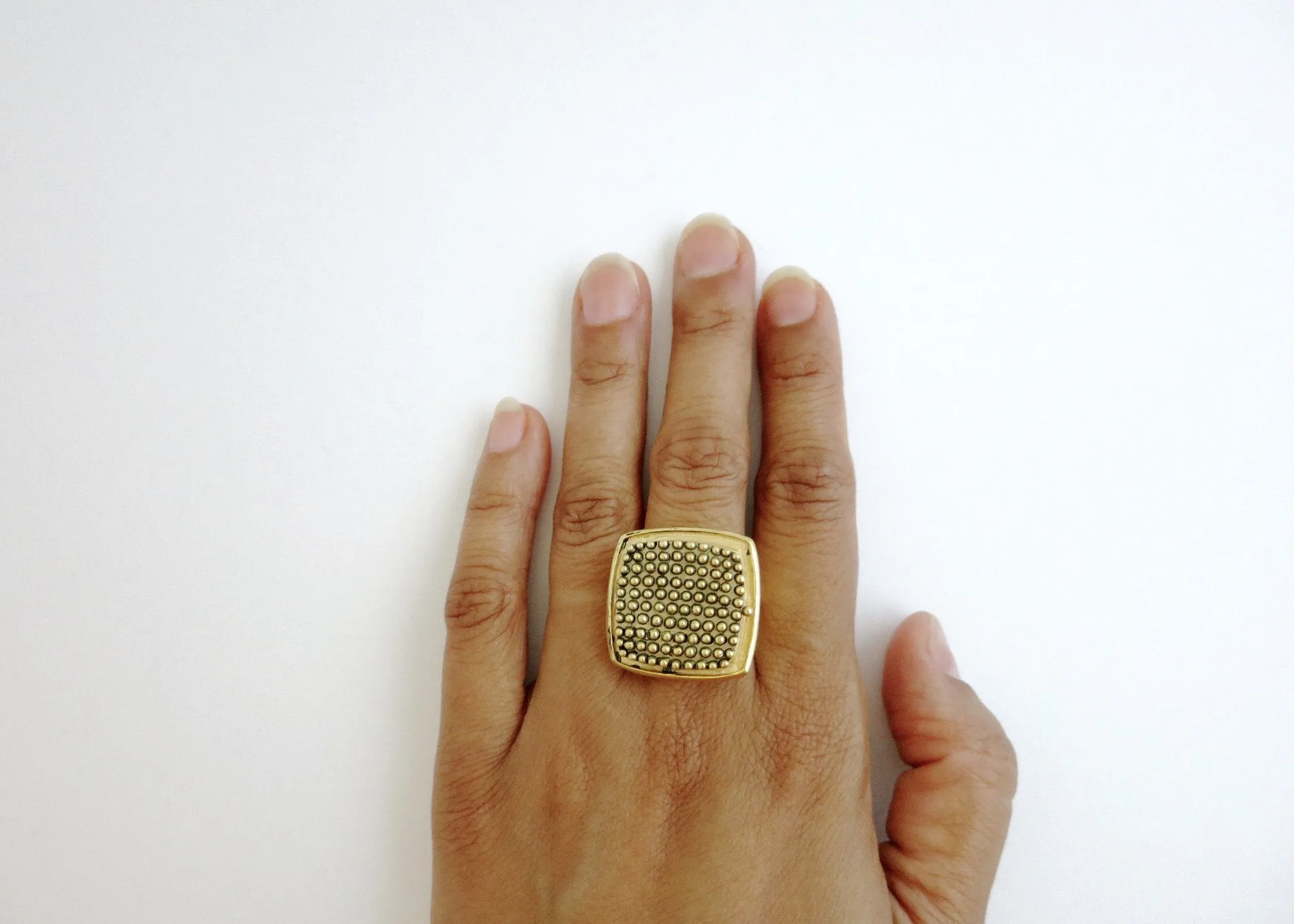 Dramatic, beaded texture, square, gold-plated brass locket ring