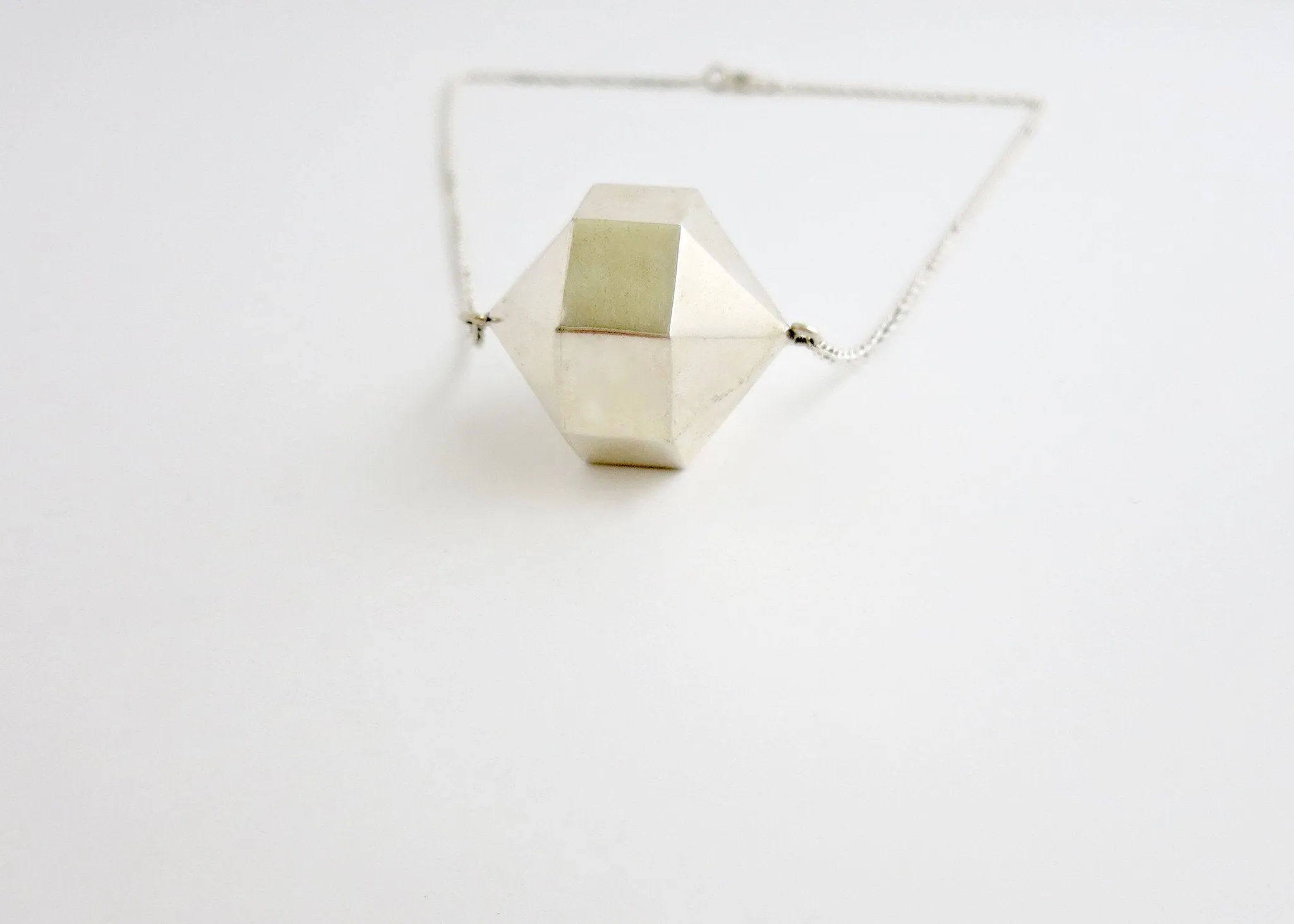 Exquisite, 24-sided polygon locket necklace in sterling silver