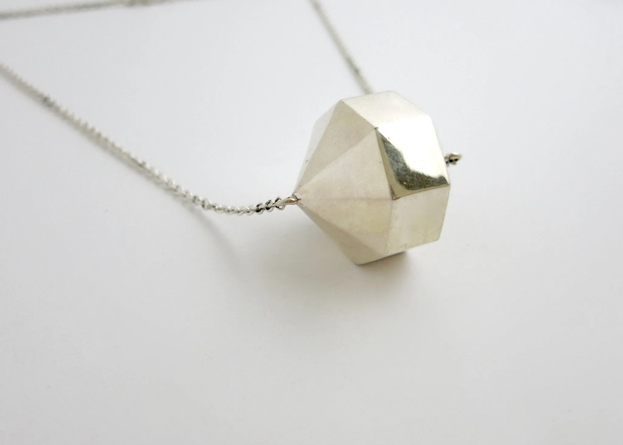 Exquisite, 24-sided polygon locket necklace in sterling silver