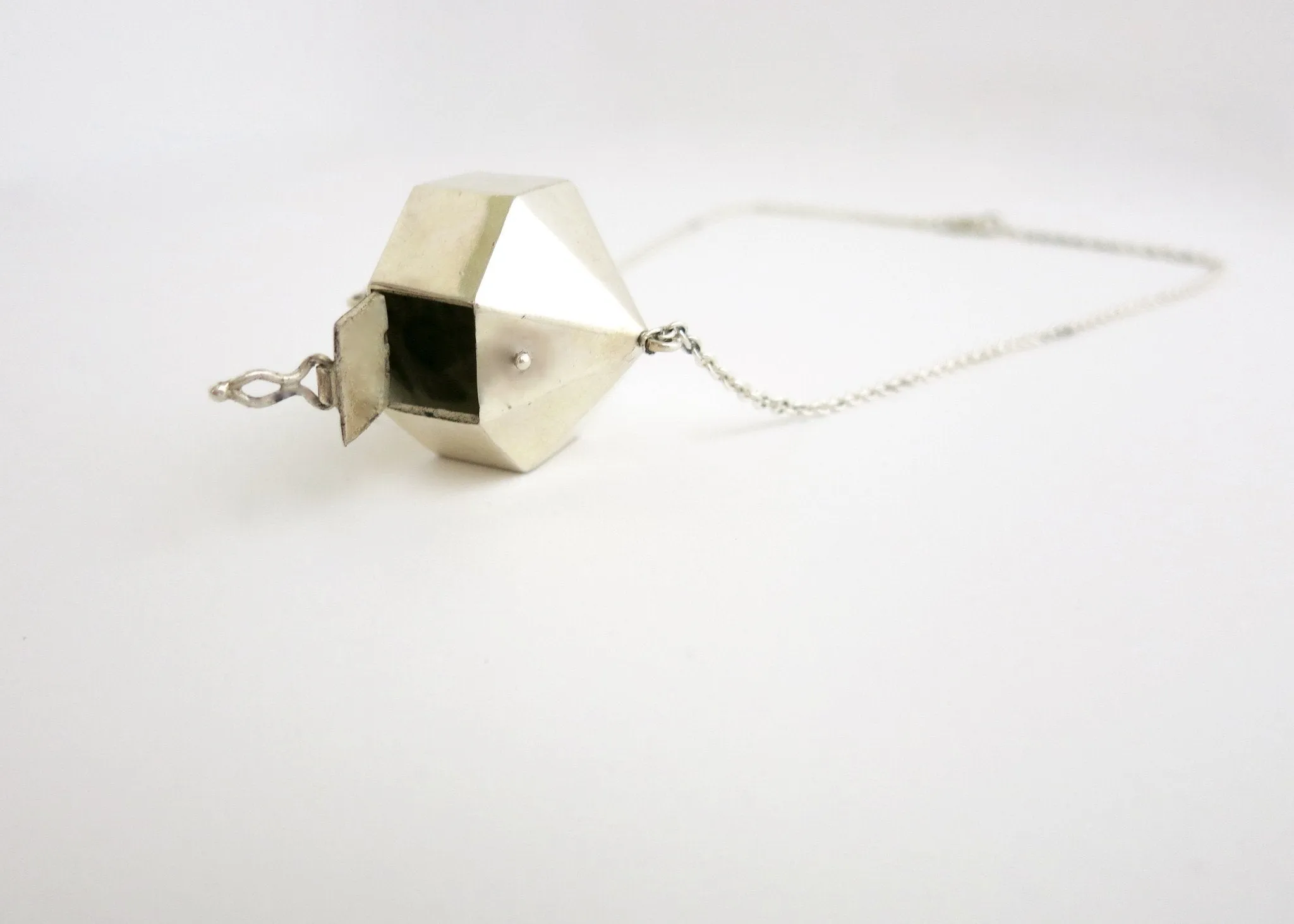 Exquisite, 24-sided polygon locket necklace in sterling silver
