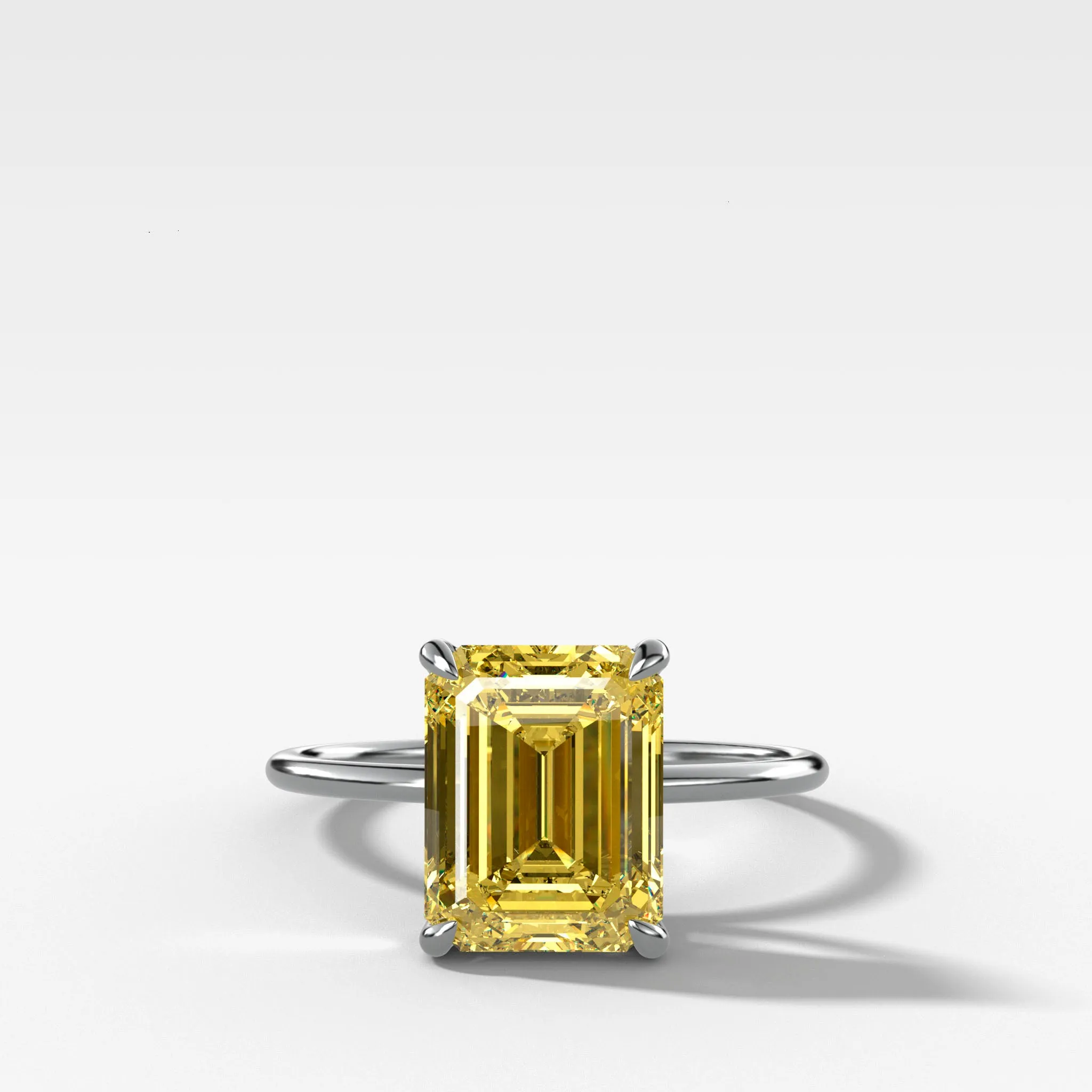 Thin   Simple Solitaire Engagement Ring With Canary Yellow North South Emerald Cut Diamond