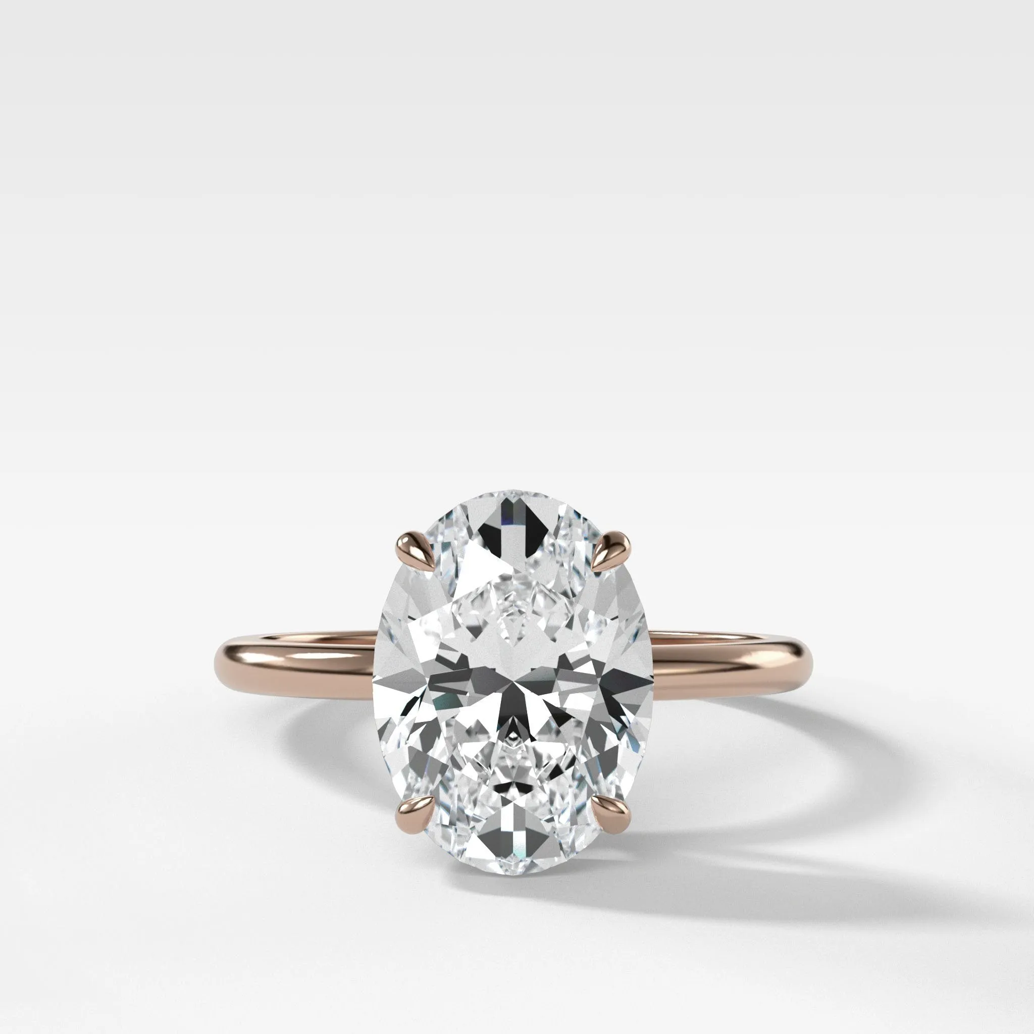Thin   Simple Solitaire Engagement Ring With Oval Cut Diamond