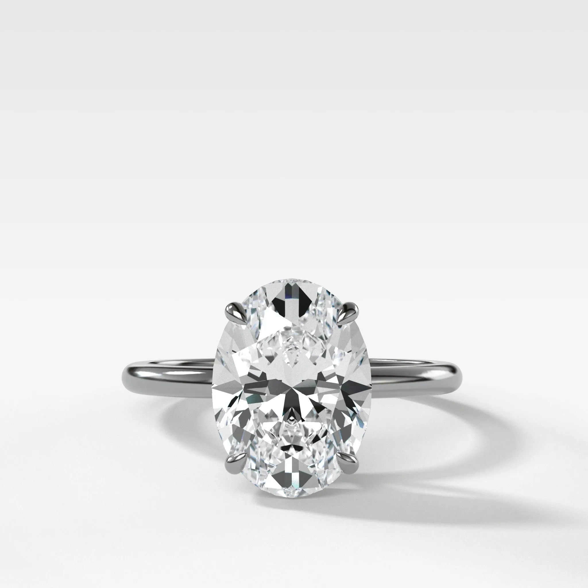 Thin   Simple Solitaire Engagement Ring With Oval Cut Diamond