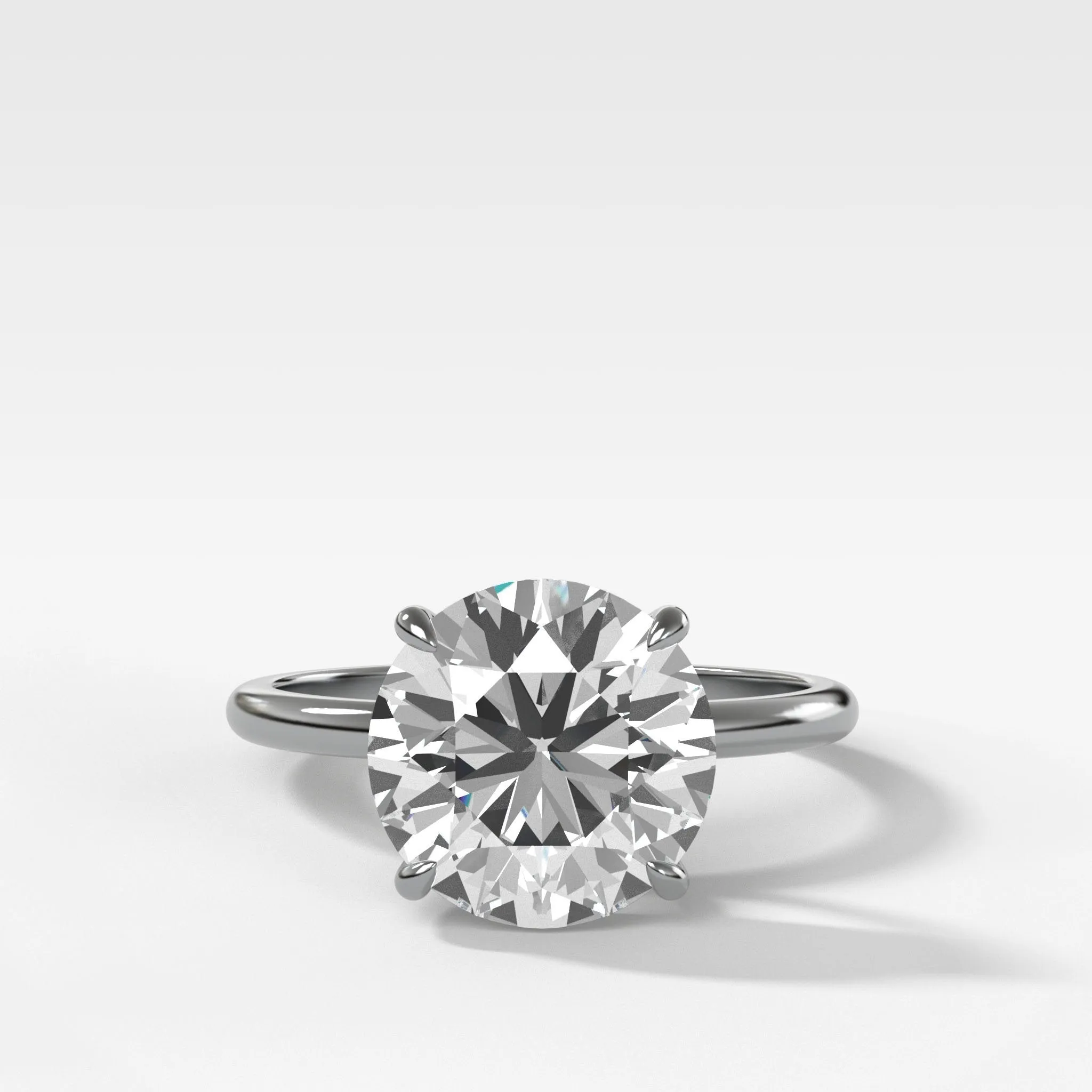 Thin   Simple Solitaire Engagement Ring With Round Brilliant Cut Diamond