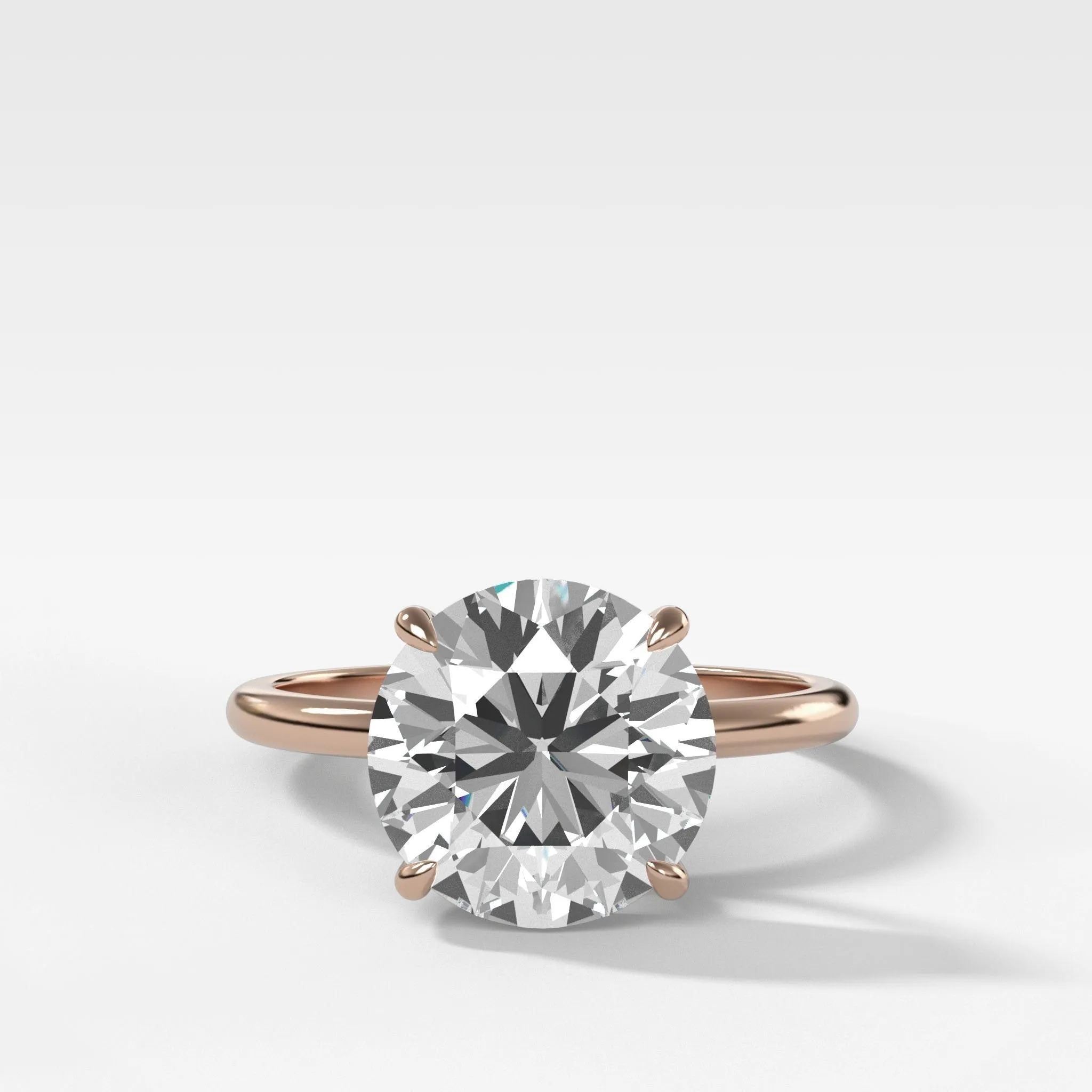 Thin   Simple Solitaire Engagement Ring With Round Brilliant Cut Diamond