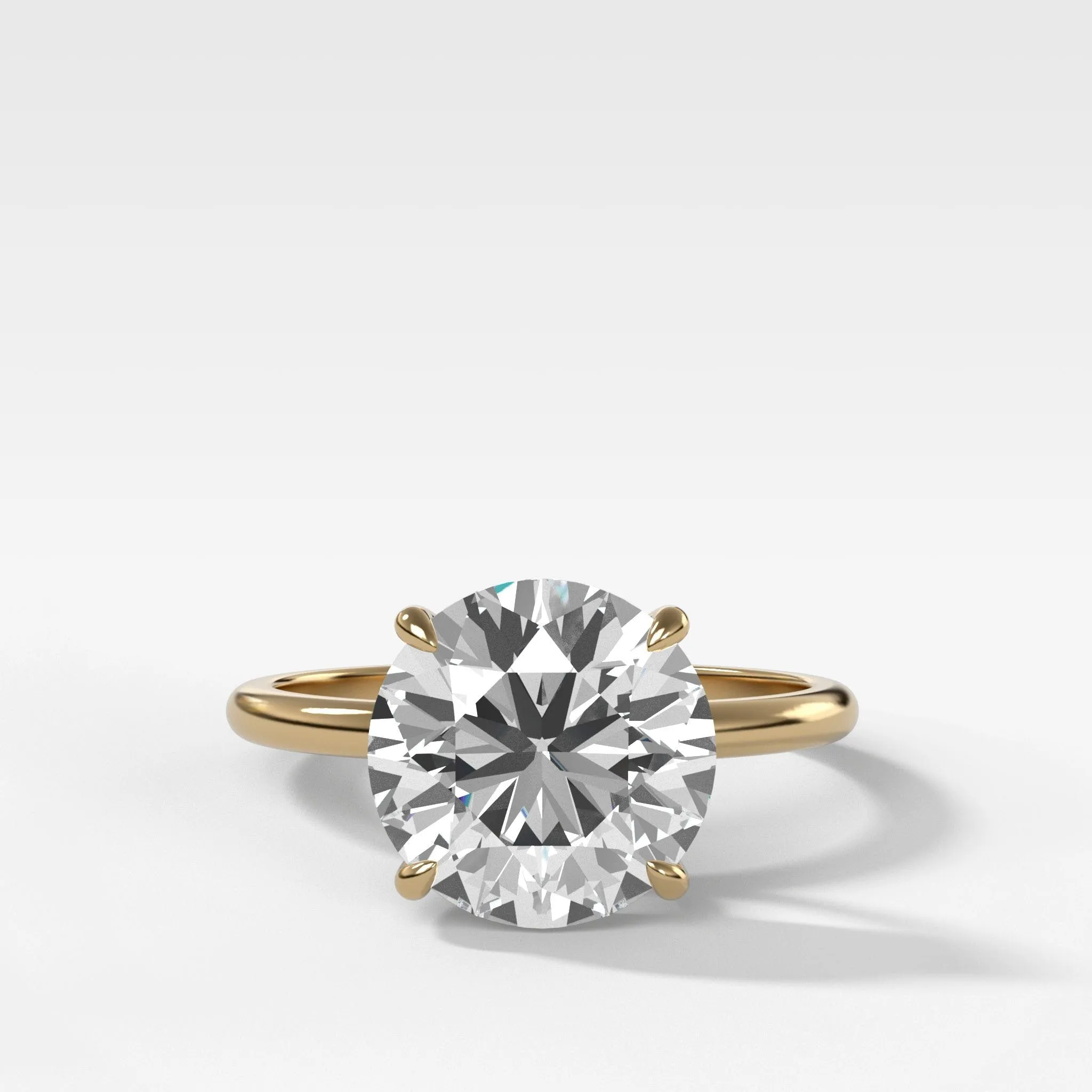 Thin   Simple Solitaire Engagement Ring With Round Brilliant Cut Diamond